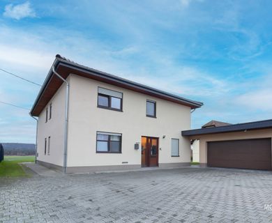 MG – Vermietetes Einfamilienhaus mit Garten und Garage in Spesbach