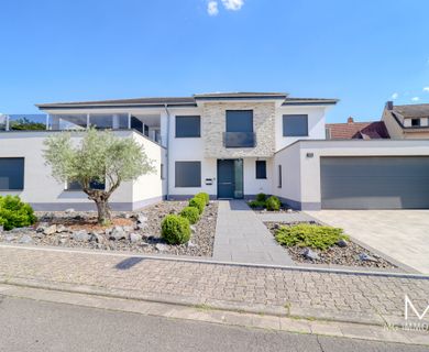 +++ RESERVIERT +++ MG – Modernes Zweifamilienhaus in Bruchmühlbach-Miesau